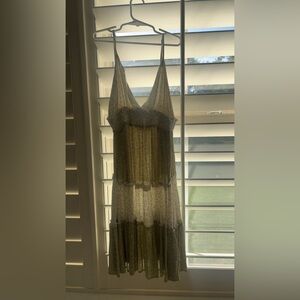 green and white floral dress, bought at a beach store